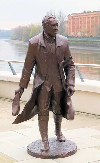 By the side of Thamesat Distillery Wharf in Hammersmith, the bronze statue of Lancelot Capability Brown