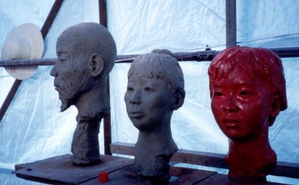 Three of the 10 clay portraits